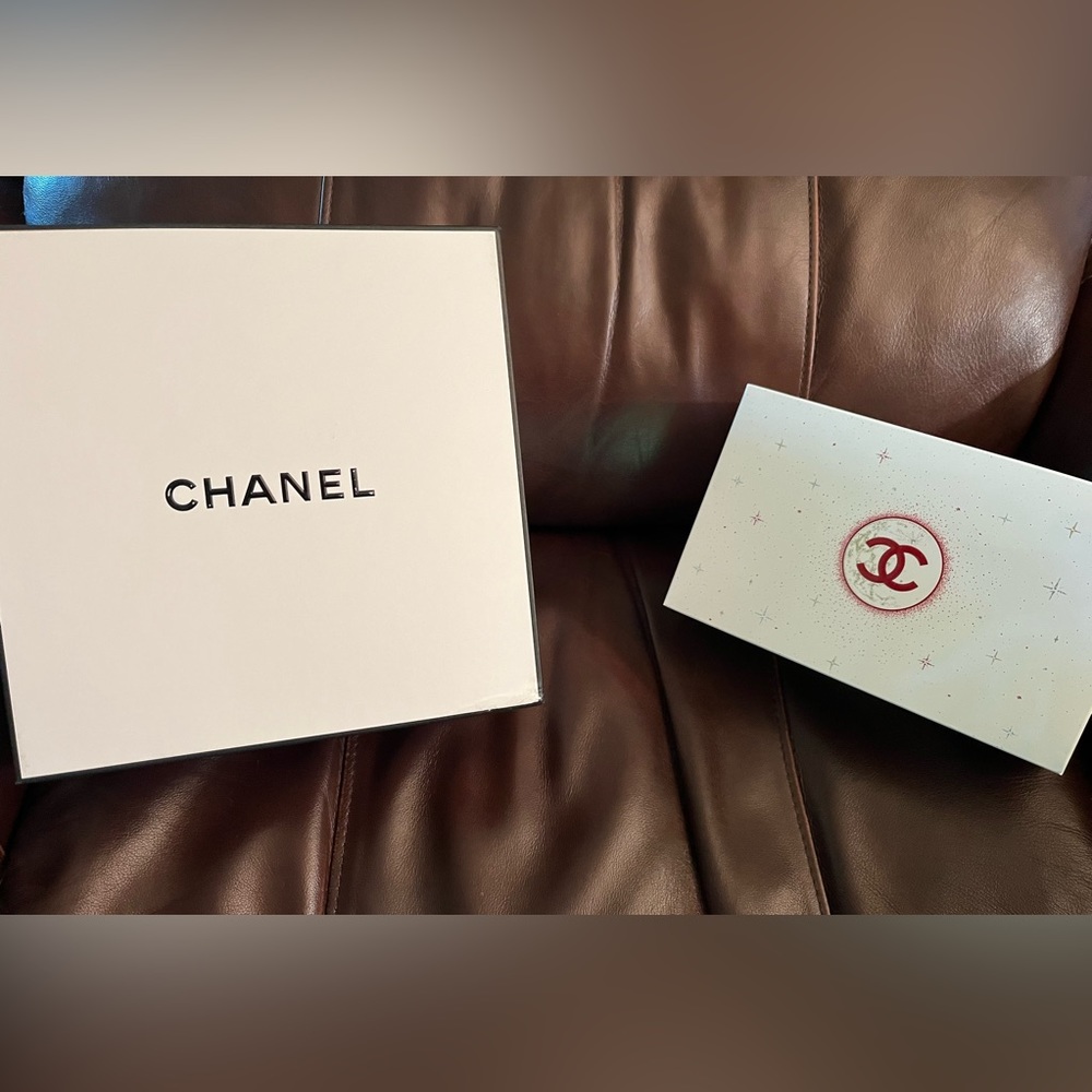 GUC Chanel boxes and tissue paper from mascara purchase, one large, one medium
